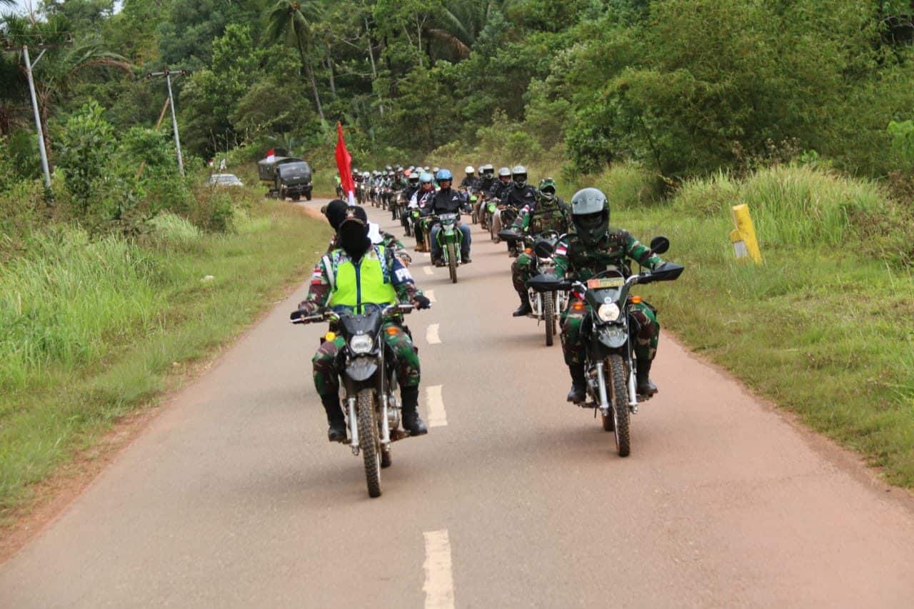 Touring Kemerdekaan, Satgas Pamtas Yonif MR 411 Berbagi Kebahagiaan di Naukenjerai