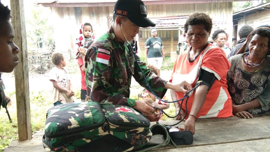 Bangkitkan Ekonomi Papua,Satgas Yonif R 509 Bangun Jalan di Pegunungan Bintang