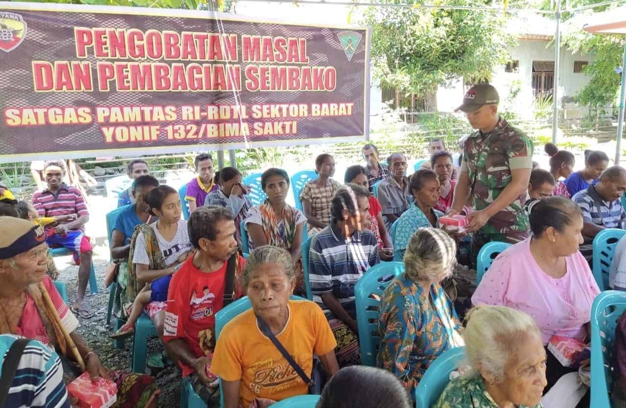 Baksos Satgas Yonif 132, Ringankan Beban Warga Perbatasan RI-RDTL