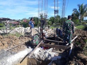 Tingkatkan Keamanan Masjid Satgas Yonif 754 Bangun Pagar dan Gerbang