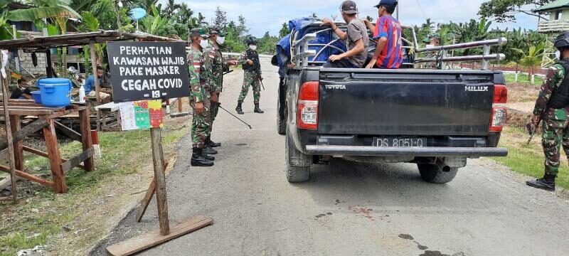 Lindungi Warga Dari Corona di Papua, Satgas Yonif R 300 Lakukan Pembatasan Pergerakan Orang