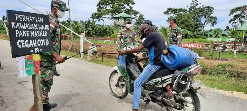 Lindungi Warga Dari Corona di Papua, Satgas Yonif R 300 Lakukan Pembatasan Pergerakan Orang