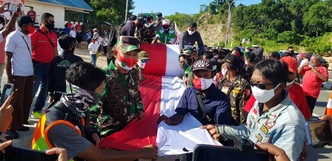 Bentangkan Bendera 1,5 Km di Jembatan Youtefa, Satukan Seluruh Elemen Masyarakat