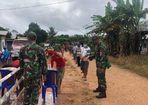 Tumbuhkan Kesadaran Masyarakat, Satgas Pamtas Yonif Mekanis 516/CY Gelar Sosialisasi Cegah Covid-19 di Boven Digoel