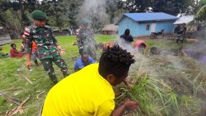 Pos Bolakme dan Pemuda Kp. Bolakme Adakan Acara Bakar Batu Menyambut Hari Raya Natal