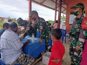 Pawai Obor Warnai Peringatan Paskah Personel Satgas Yonif 131 Bersama Masyarakat Papua