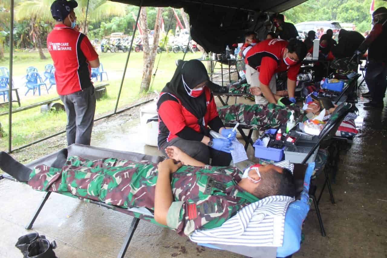 Gandeng HCPI-JS dan PMI, Satgas Yonif 131 Gelar Baksos di Papua