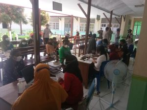 Satgas Yonif 131/Brs Bersama Instansi Terkait Gelar Serbuan Vaksinasi Covid-19 di Papua