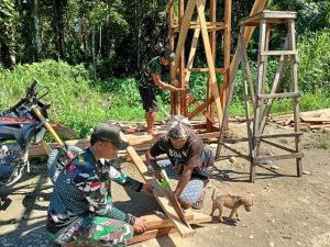 Satgas Pamtas 131/Brs Membangun Gapura Selamat Datang Di Kampung Skofro Papua
