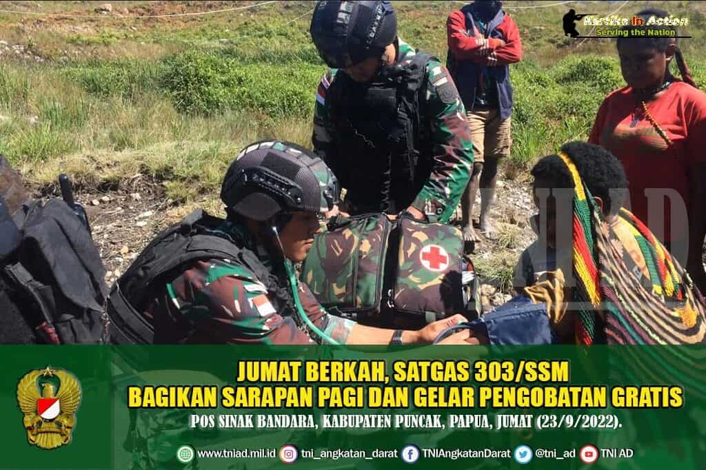 Jumat Berkah, Satgas 303/SSM Bagikan Sarapan Pagi dan Gelar Pengobatan Gratis