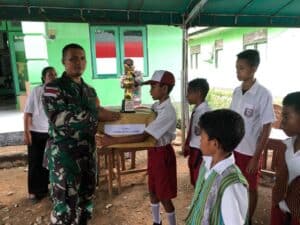 Meriahkan HUT TNI, Satgas Yonif RK 744/SYB Gelar Cerdas Cermat Tingkat Sekolah Dasar