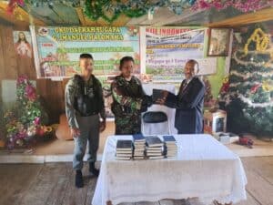 Sinergitas TNI-POLRI Berbagi Kasih dan Berikan Pelayanan Kesehatan di Papua