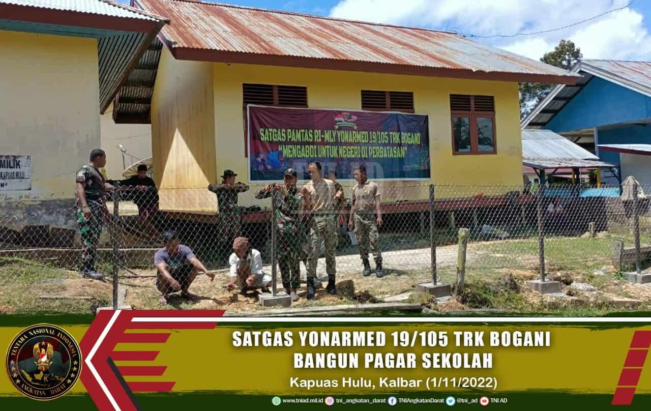 Satgas Yonarmed 19/105 Trk Bogani Bangun Pagar Sekolah di SDN 1 Badau