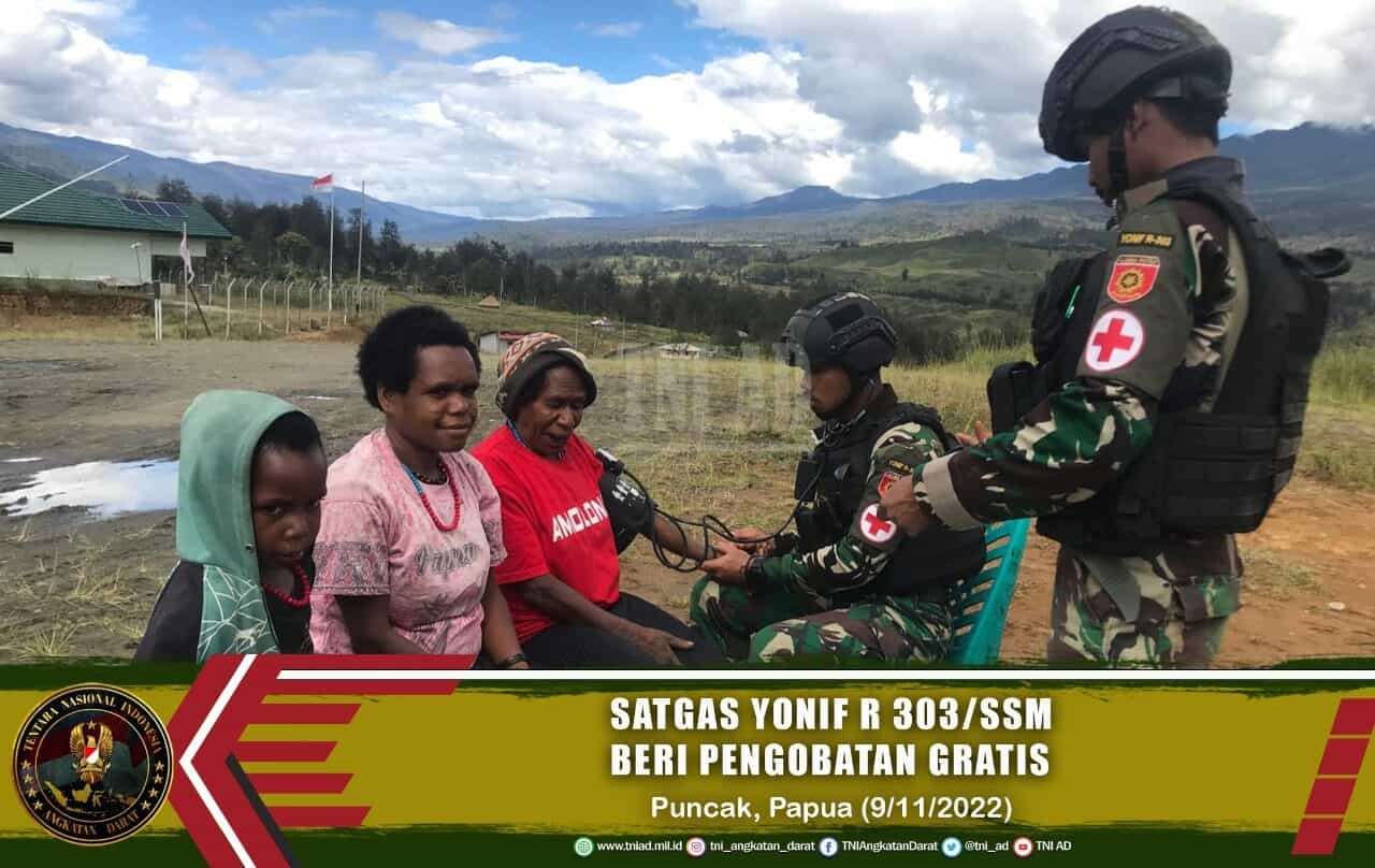 Satgas Yonif R 303/SSM Beri Pengobatan Gratis Warga Papua