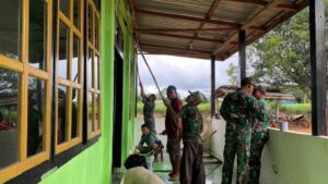 Satgas Yonif 511/DY bantu Pengecatan Masjid Di Perbatasan RI-PNG