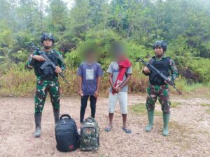 Satgas Pamtas RI-Malaysia Yonarmed 19/105 Trk Bogani Amankan Dua Orang PMI Non Prosedural di Jalur Tidak Resmi