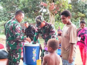 Wujudkan Papua Sehat Sejahtera, Satgas Yonif 125/SMB Gelar Layanan Kesehatan dan Bagikan Bubur Kacang Hijau