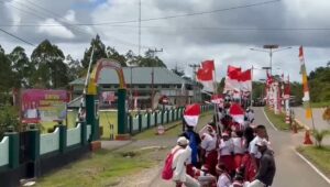 Dandim Boven Digoel Pimpin Pawai Bendera Merah Putih