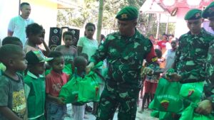 Berbagi Kasih, Menyambung Hati Personel Satgas Yonif 125/SMB Dengan Masyarakat Papua
