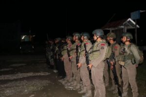 Apel Gabungan, Satgas Yonif 411 Kostrad Bersinergi Pastikan Kenyam Aman