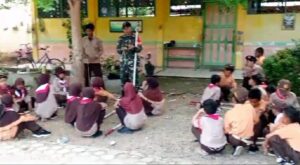 Babinsa Koramil 1002-08/Lau Bina Pramuka di SDN 2 Kasarangan