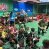 Semangat Anak-anak Paud Melaksanakan Jalan Sehat Bersama Satgas Yonif 125/SMB